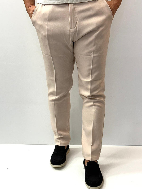 Pantaloni irreversible con trama spigata