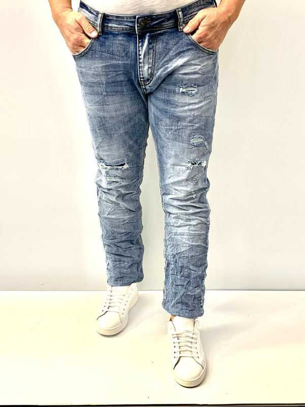 Jeans 2.0 chiaro elasticizzato con strappi