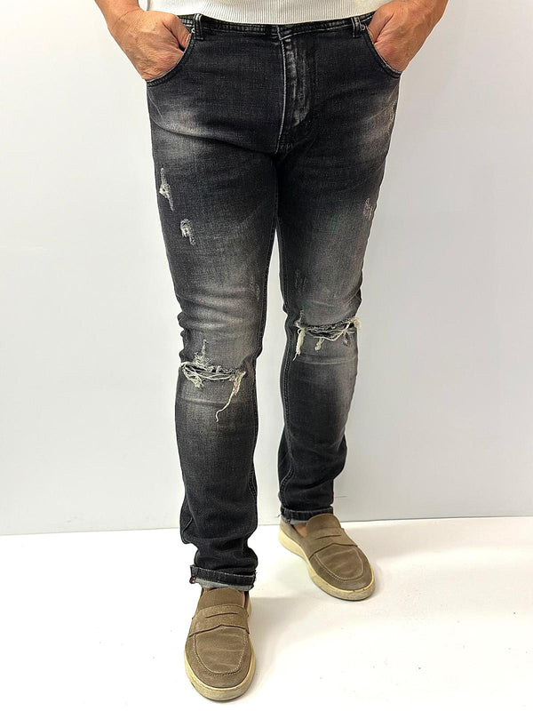 Jeans Irreversible Grigio scuro con strappi e risvolto